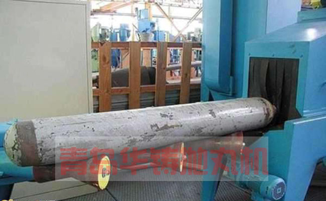 滅火器罐拋丸機設(shè)備除銹噴砂現(xiàn)場圖